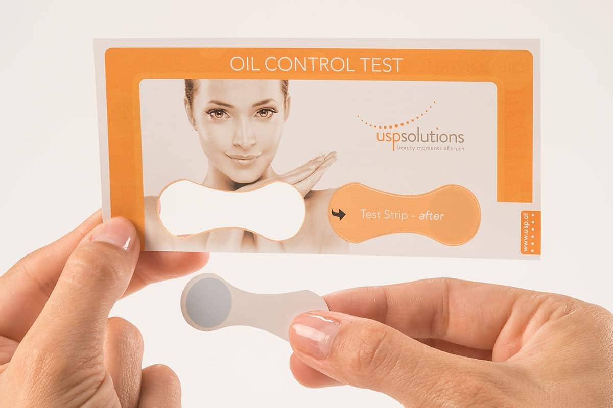 Oil Control Test - Before test strip held in hand | USP Solutions